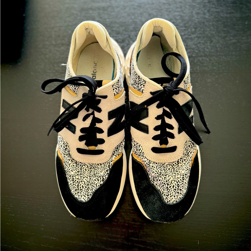 New Balance leopard tennis shoes, worn a handful of times. Great condition.